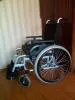 Инвалидное кресло-коляска.