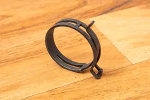 Хомут самозажимной пружинный