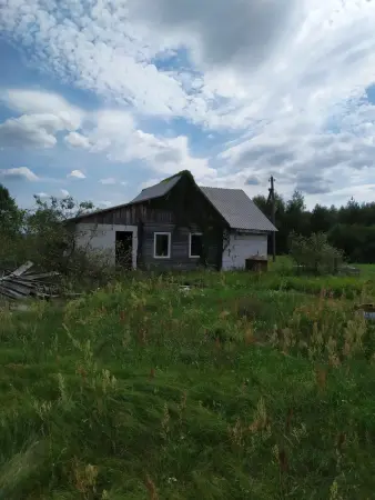 Продажа земельного участка с недостроенным домом