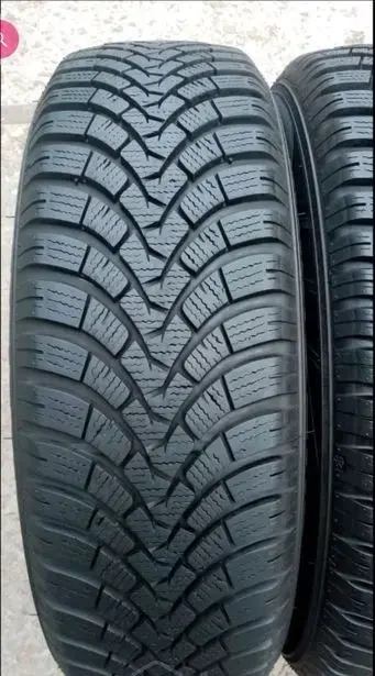 Зимние шины 195/65 R15 FALKEN (2 шт.)