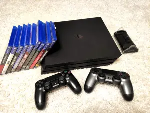 Приставка Sony Playstation 4 Pro+2джойстик+9дисков