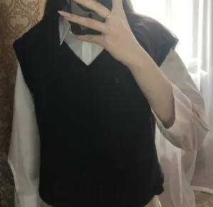 Жилетка