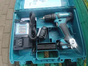 Профессиональная дрель-шуруповерт Makita DF333DWYE
