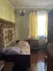 Продается деревянный дом с печным отоплением общей площадью 34 кв м с земельным участком 15 соток, расположенный в г. Чаусы Могилевской области