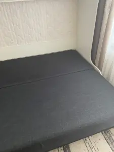 Кровать двухъярусная с диваном.
