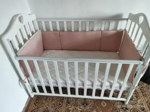 Детская кроватка маятник