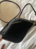 Женская сумка черная на тонком ремешке