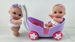 Пупсы-близнецы в коляске JC TOYS, BERENGUER (Испания)