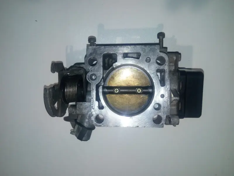 Заслонка дроссельная Mazda 323 BG