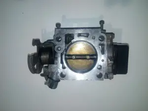 Заслонка дроссельная Mazda 323 BG