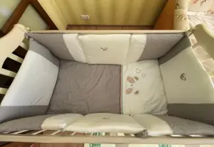 Детская кроватка с маятником и ящиком