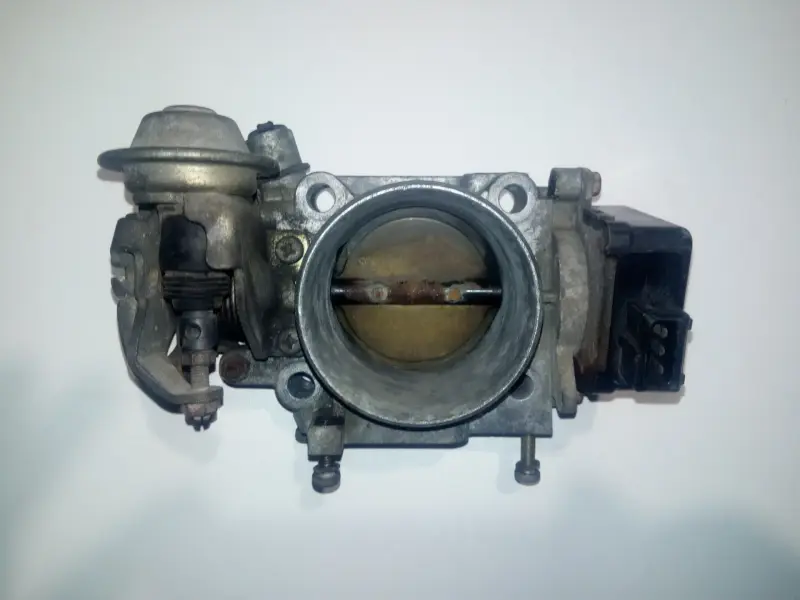 Заслонка дроссельная Mazda 323 BG