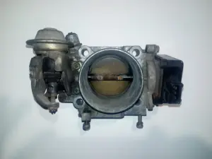 Заслонка дроссельная Mazda 323 BG