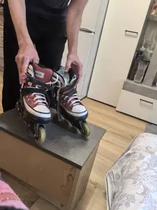 Роликовые коньки