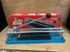 Плиткорез Top Tools 300 мм (а.83-016571)