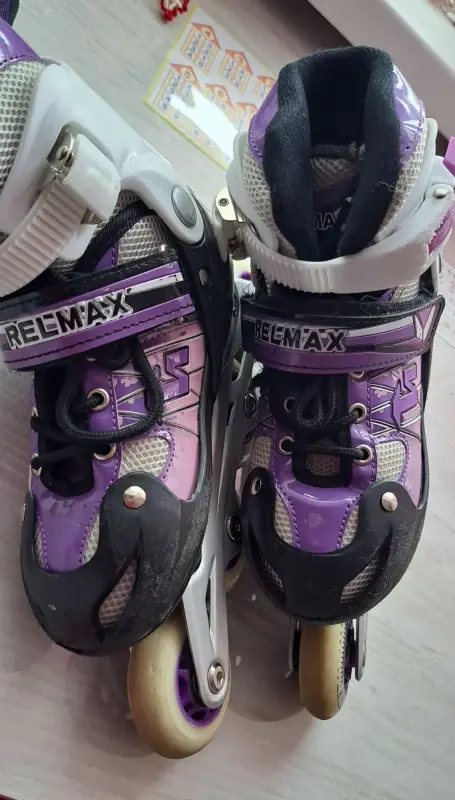 Ролики сиреневые, р.30-33, б.у