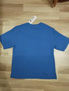 Футболка р-р 48(M)- 50(L)-новая.