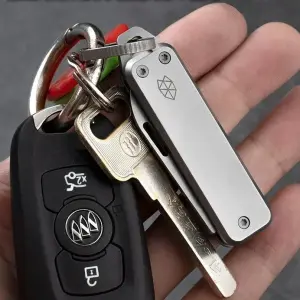 Складной нож брелок продам.