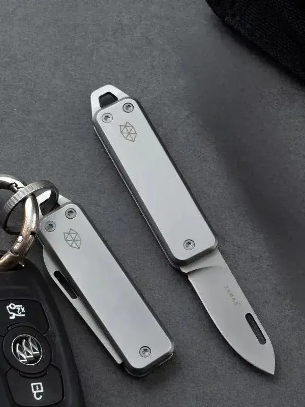 Складной нож  брелок продам.