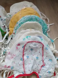 Чепчики новые около 70 шт. Цена за штуку.