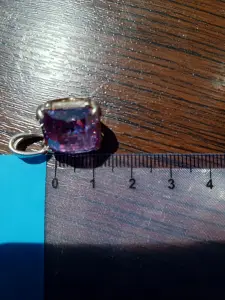 Серебряная цепочка с кулоном.