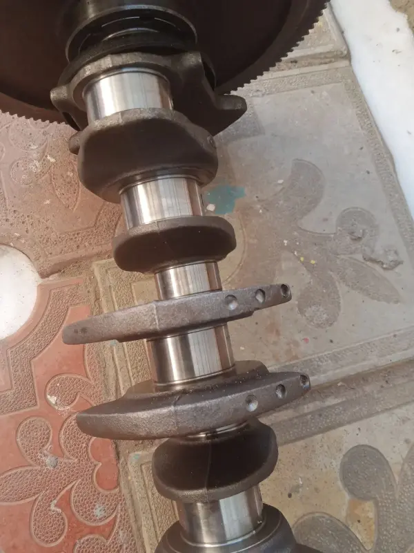 Коленвал в месте с маховиком