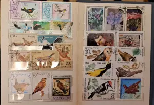 Альбом с марками-42шт: цветы, птицы, спорт, живопись