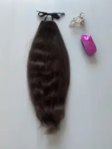 Шиньон (хвост) из натуральных волос.