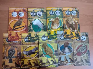 Буклеты к монетам серии Птушка года