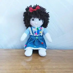 Текстильная куколка в джинсовой юбочке.