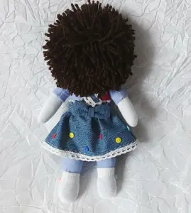 Текстильная куколка в джинсовой юбочке.