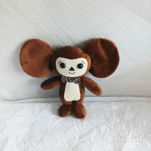 Большой зайчик из плюша и Чебурашка. Цены разные.