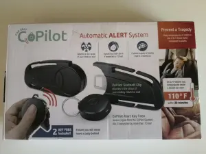 Фиксатор ремня детского автокресла с сигнализацией