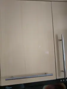 Кухонные фасады ЛДСП с мебельными ручками.