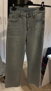 Джинсы новые