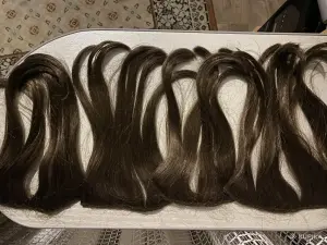 Накладные пряди. Волосы на заколке искусственные.