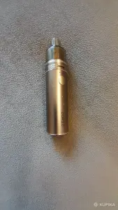 VooPoo Doric 60 Pod Kit золотистого цвета с цилиндрическим металлическим корпусом.