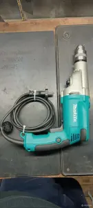 Ударная электродрель Makita hp2050