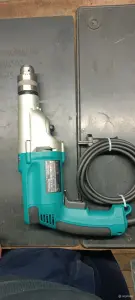 Ударная электродрель Makita hp2050