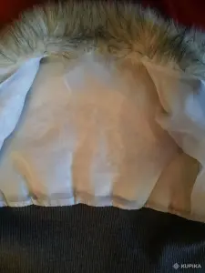 Меховая жилетка