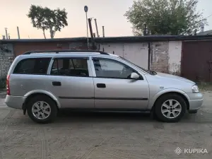 Опель астра g